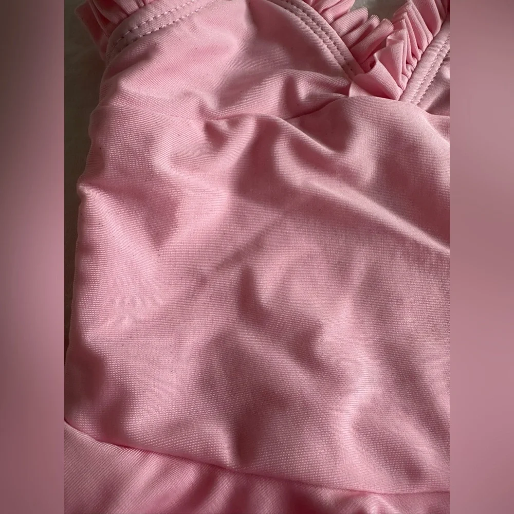 Baby pink swimsuit size 6-9 months